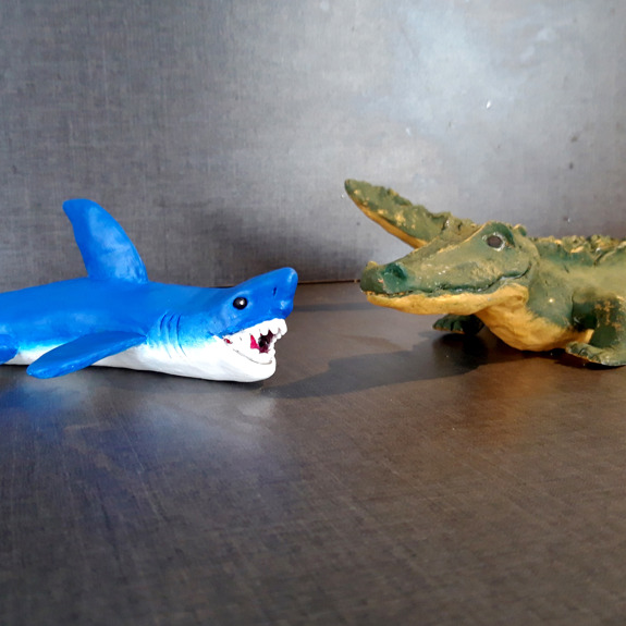 Hajen och krokodilen träffas.