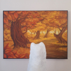 Fjällräven tittar på en hösttavla.